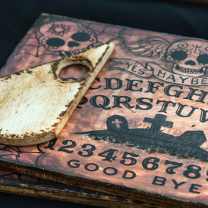 Be very careful about using a Ouija board if you're not familiar with the dangers of this tool.
