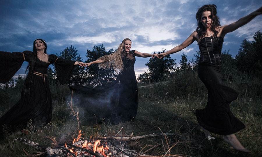 coven dancing near bonfire