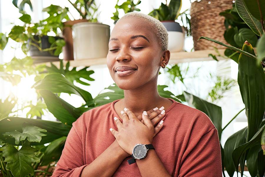 Blissful meditating woman